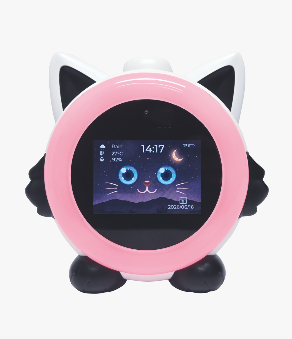A cat-shaped smart alarm clock with a pink circular face, black ears and feet, and a screen displaying a cartoon cat face.