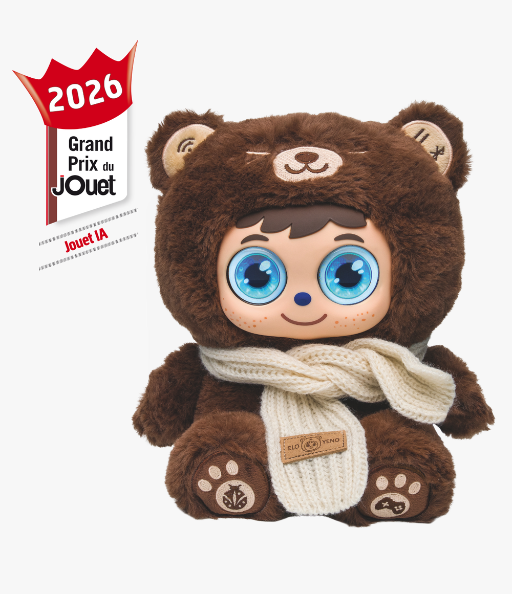 ELO Yetno AI interactive plush toy with large blue animated-style eyes, wearing a brown bear costume and a white knitted scarf. The product is shown on a light gray background alongside a "Grand Prix du Jouet 2026 - Jouet IA" award badge.