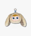 Plush toy with a face and bunny ears on a white background