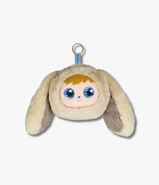 Plush toy with a face and bunny ears on a white background